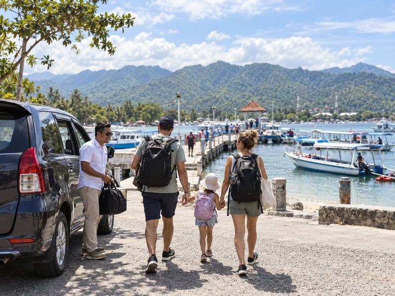 Travelers arriving at Bangsal Harbor for Gili Air
