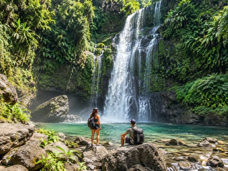 traveler visit Lombok waterfall